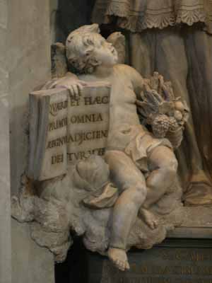 Angel holding Book at the base of St Cajetan Thiene statue